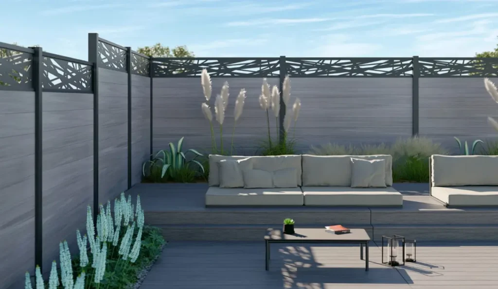 Composite Fencing in a modern yard with built in composite deck