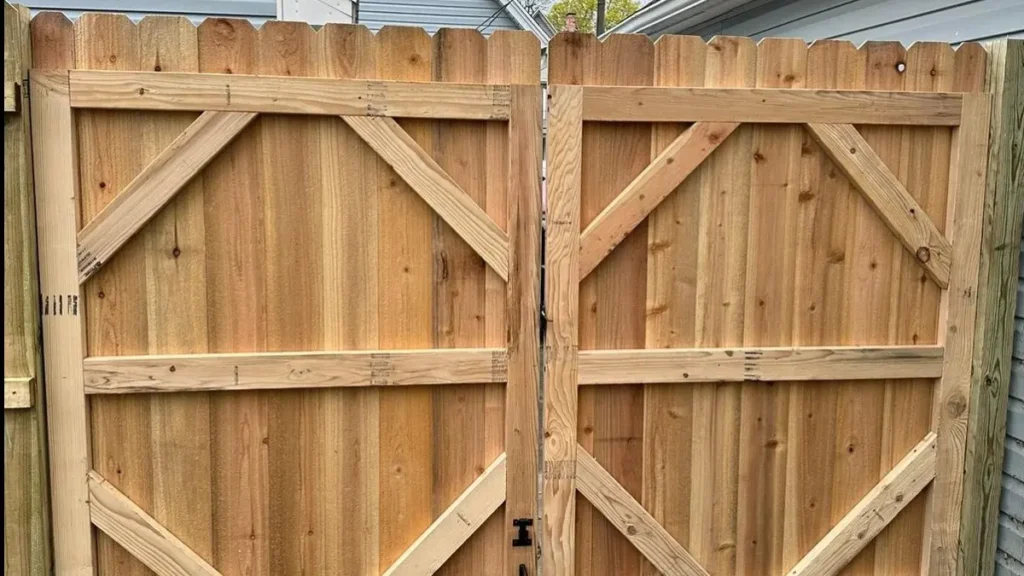 Sturdy wooden gate installed at the entrance of a residential property