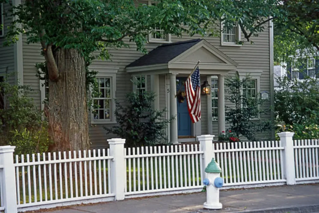 PIcket fence infront of Residential house
