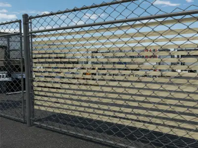 Privacy slats in commercial chain link fence enhancing security and visual privacy for business property while maintaining durability and airflow