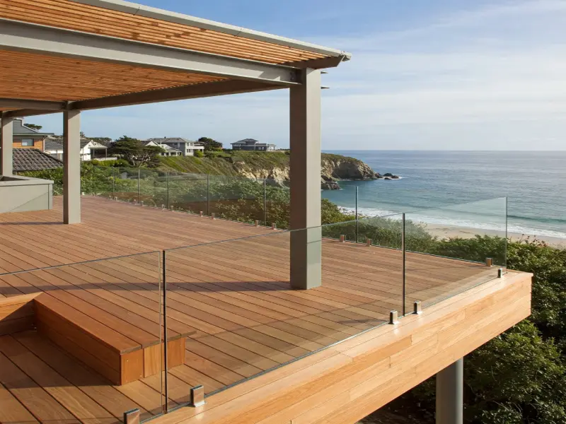 Coastal Deck with seating and glass railings