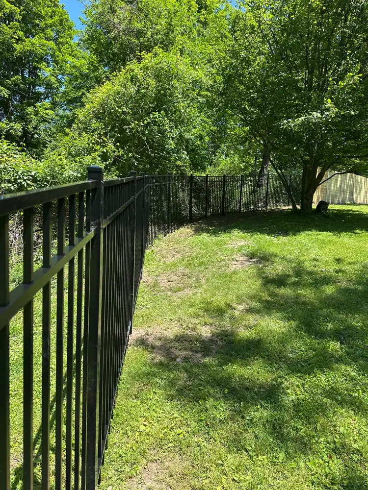 Black aluminum ornamental fence installed by KD Fence Rochester