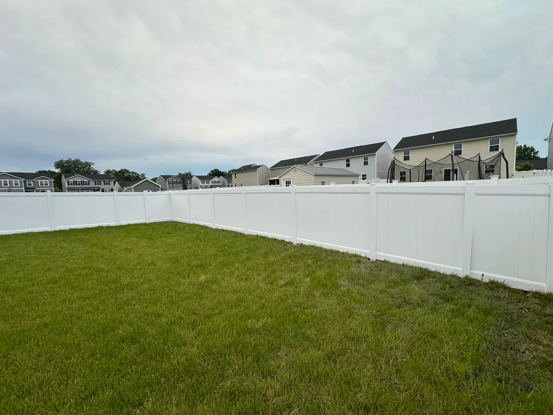 White vinyl privacy fence installed by KD Fence in Rochester NY