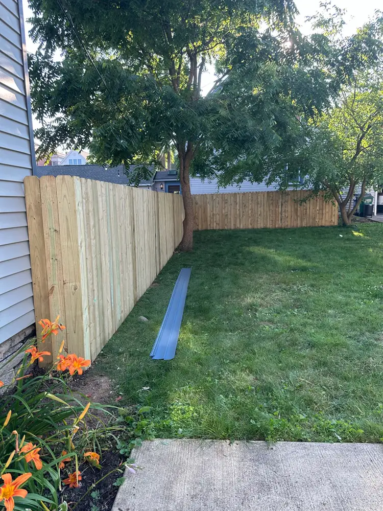 Wood privacy fence installed by KD Fence at a Rochester NY home